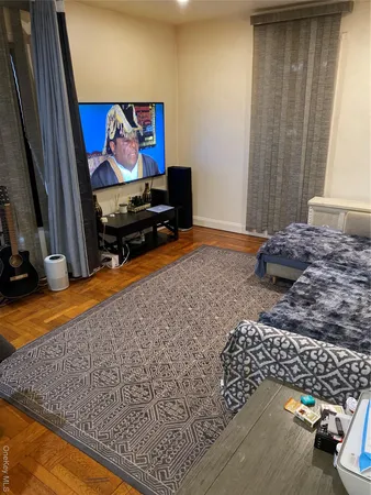 a living room with rug