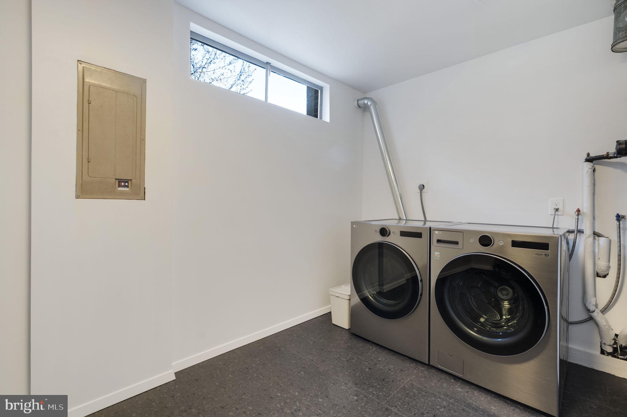 11527 Hickory Cluster Reston, VA 20190 - Photo 13 of 30 a utility room with dryer and washer