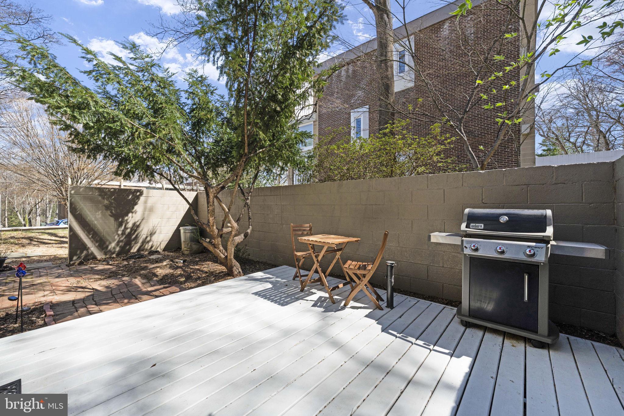 11527 Hickory Cluster Reston, VA 20190 - Photo 15 of 30 a view of a chairs and table on the terrace