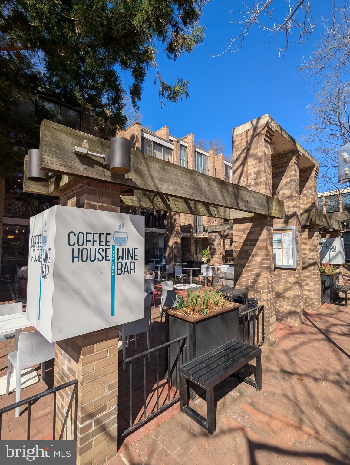 11527 Hickory Cluster Reston, VA 20190 - Photo 26 of 30 a view of a chairs and table in a patio