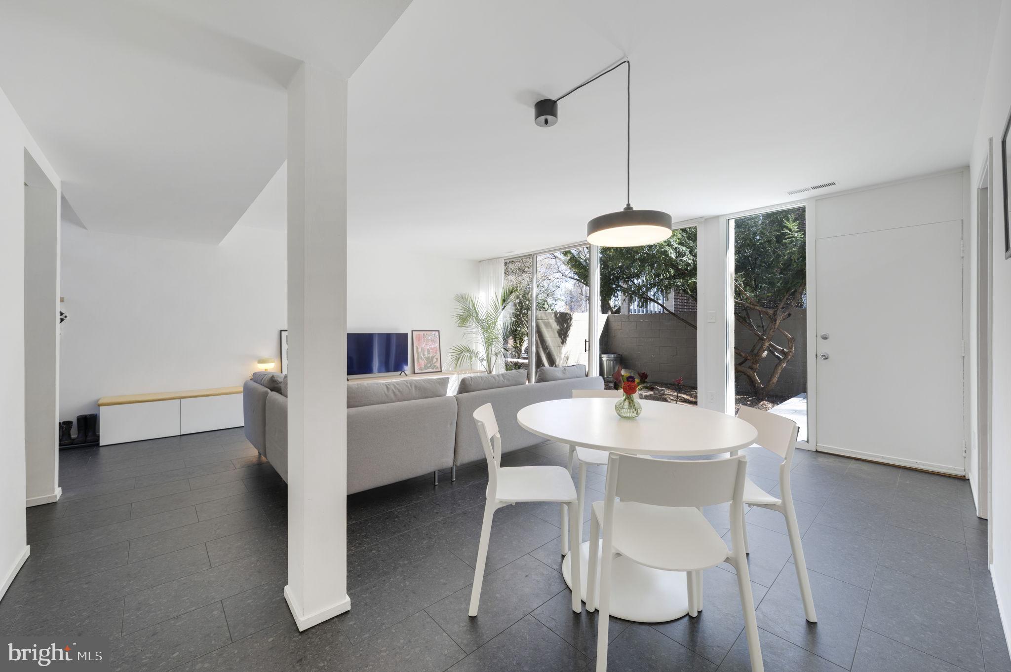 11527 Hickory Cluster Reston, VA 20190 - Photo 9 of 30 a dining room with furniture and wooden floor