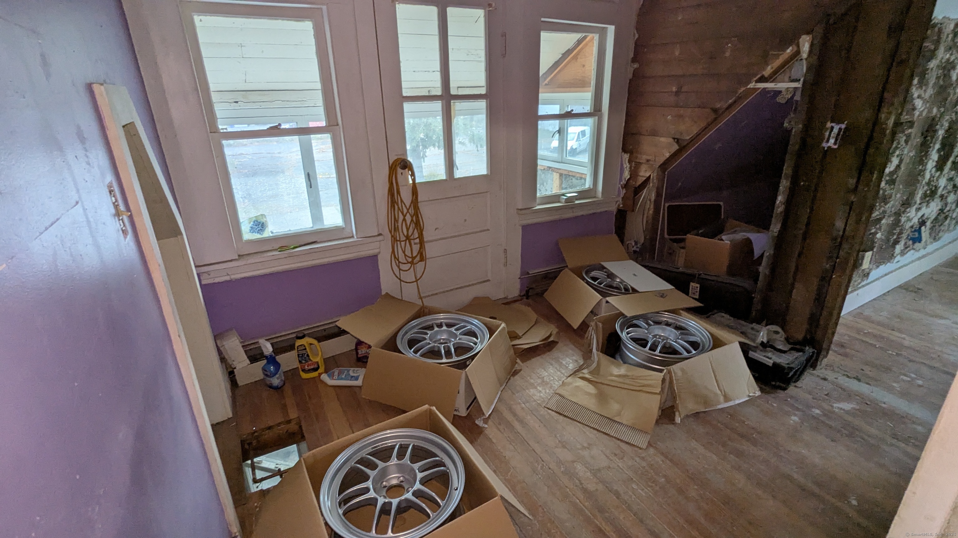 Undisclosed Address Fairfield, CT 06825 - Photo 12 of 14 a view of a entryway with furniture and rug