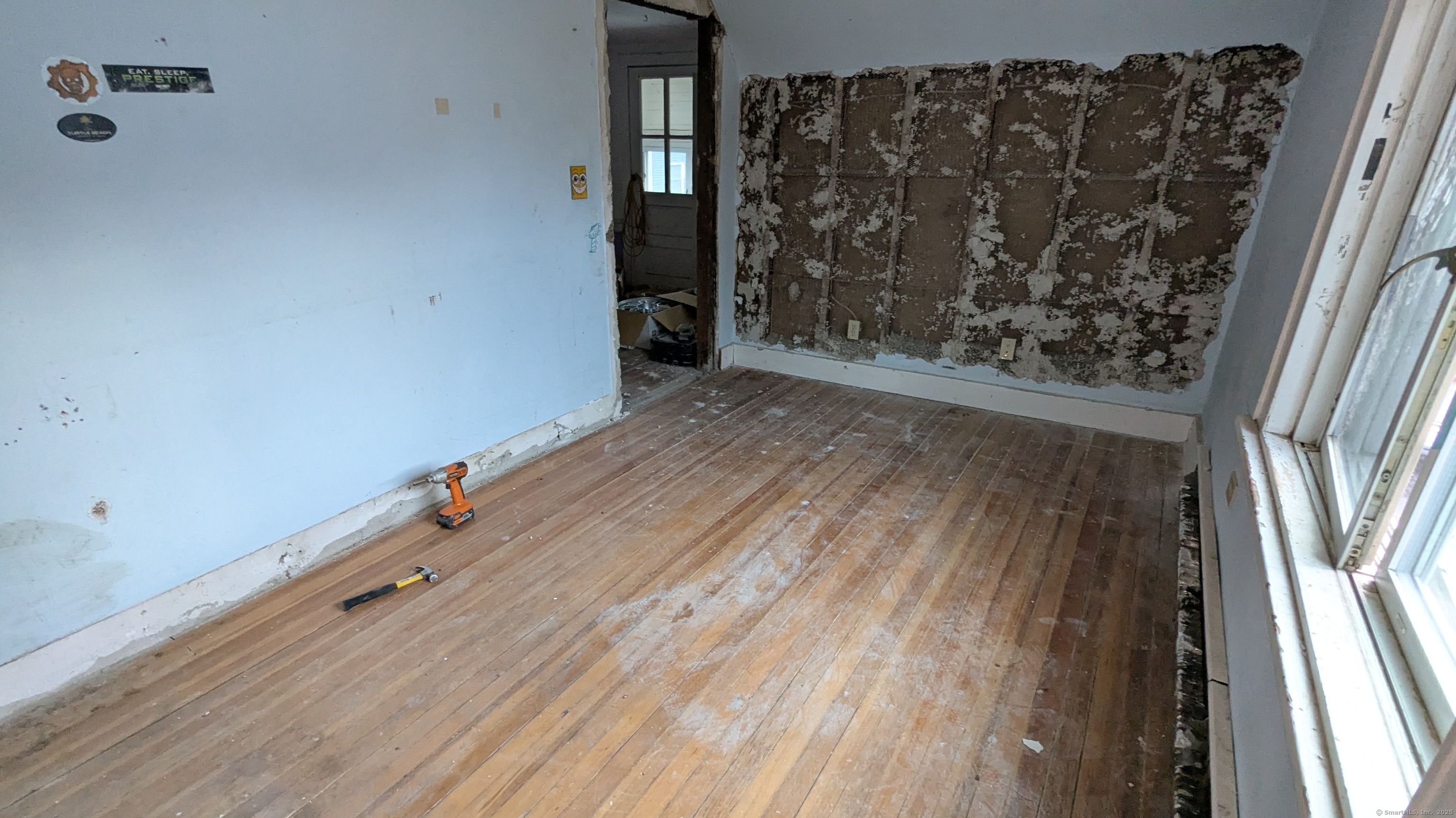 Undisclosed Address Fairfield, CT 06825 - Photo 14 of 14 wooden floor in a hall with an entrance