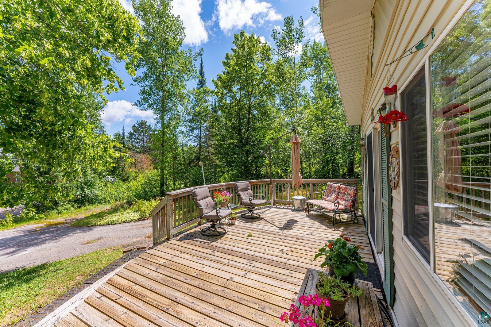 3609 Fectos Road Tower, MN 55790 - Photo 12 of 24 Wooden terrace featuring view of wooded area