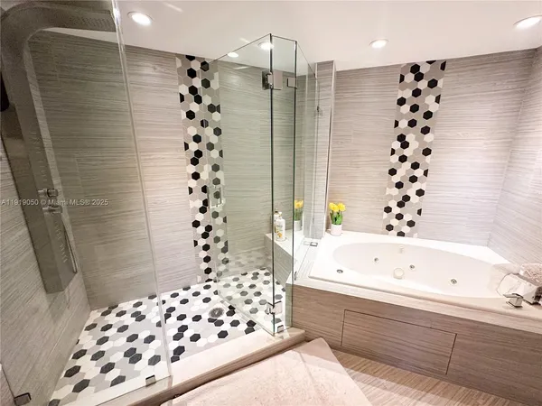 a bathroom with a toilet and a shower curtain