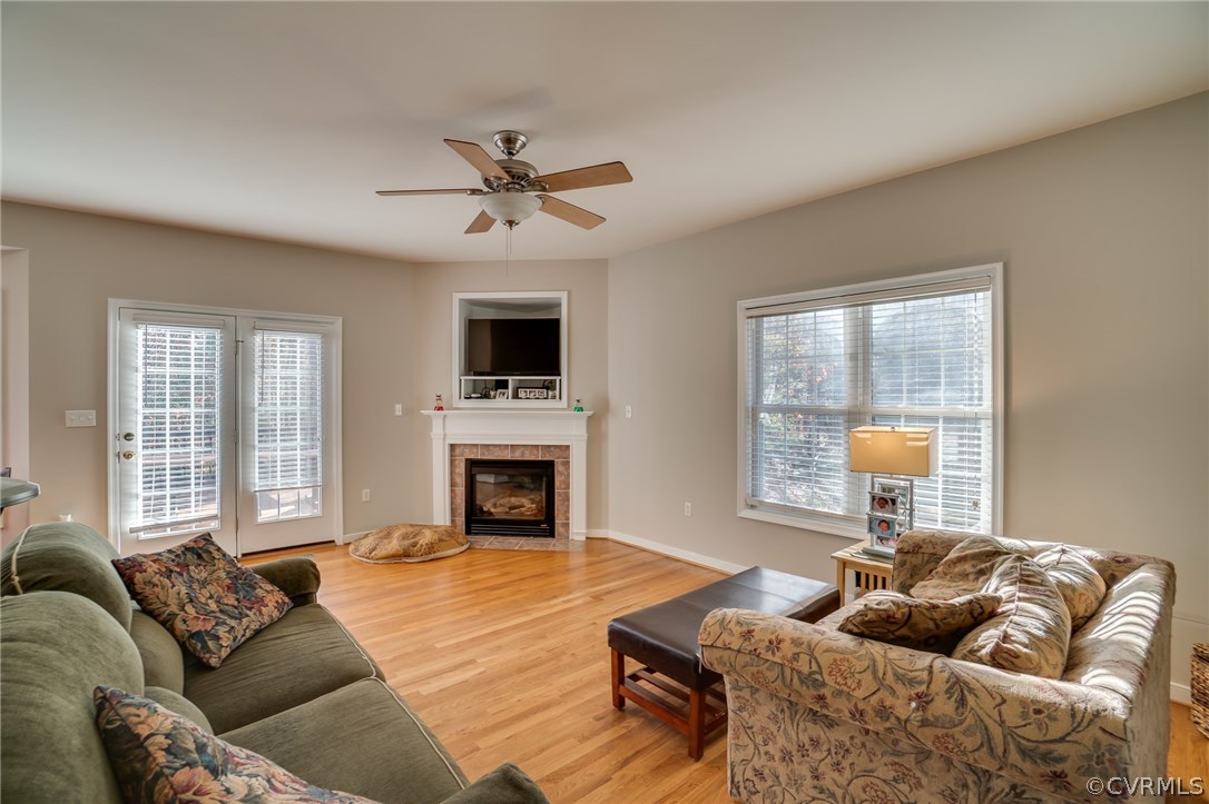 14721 Nash Road Chesterfield, VA 23838 - Photo 7 of 39 a living room with furniture fireplace and a window