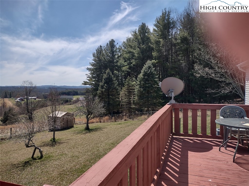 1407 Barrett Road Ennice, NC 28623 - Photo 6 of 24 a view of balcony with furniture