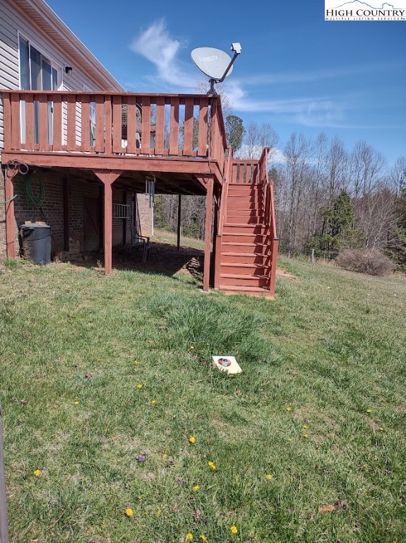 1407 Barrett Road Ennice, NC 28623 - Photo 7 of 24 a view of a house with porch and garden