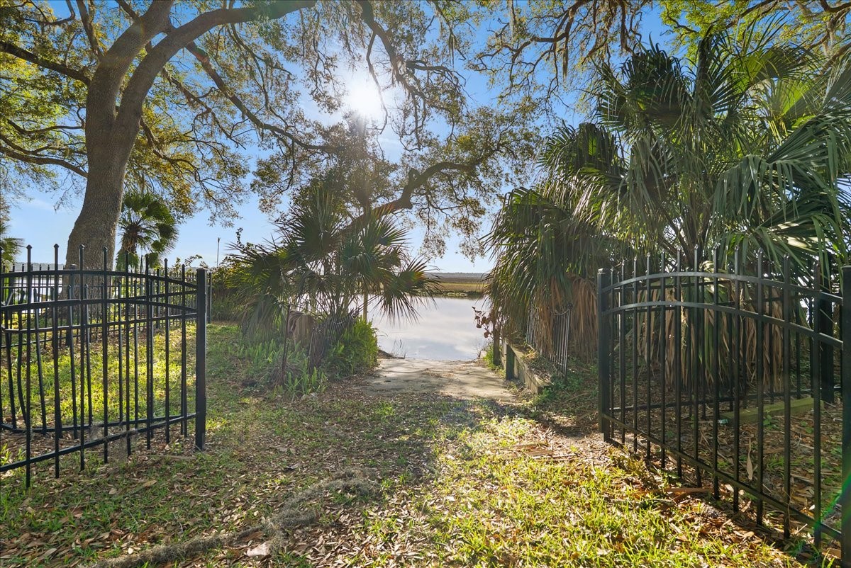 85316 Avant Road Yulee, FL 32097 - Photo 49 of 62 a view of lake with wooden fence