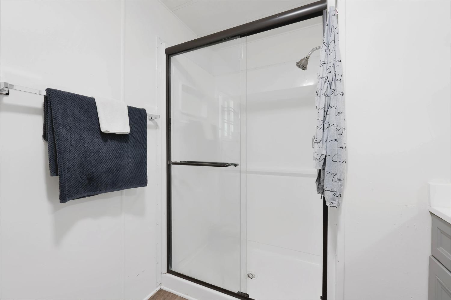 10035 Mills Station Road, Unit 153 Sacramento, CA 95827 - Photo 11 of 24 a bathroom with a shower