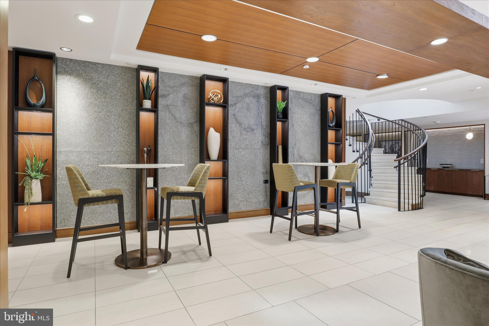 631 D Street Northwest, Unit 1227 Washington, DC 20004 - Photo 27 of 63 a view of a chairs and table in a room