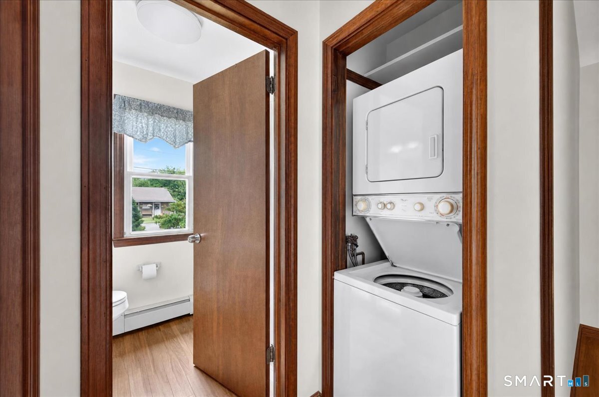 1324 Boston Post Road Old Saybrook, CT 06475 - Photo 11 of 20 Stacked washer and dryer and full bath
