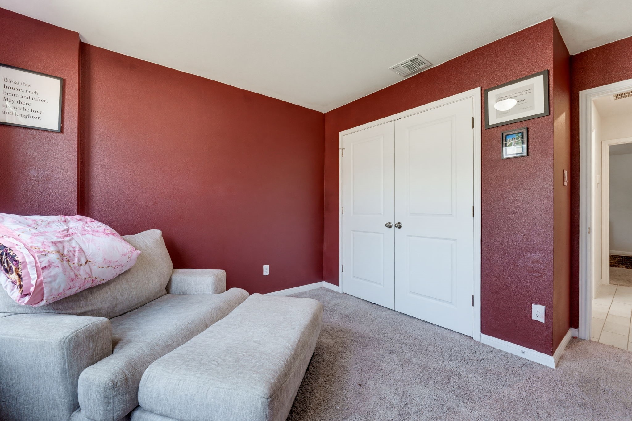 316 Windstar Road Liberty Hill, TX 78642 - Photo 20 of 27 a bedroom with a bed and a potted plant