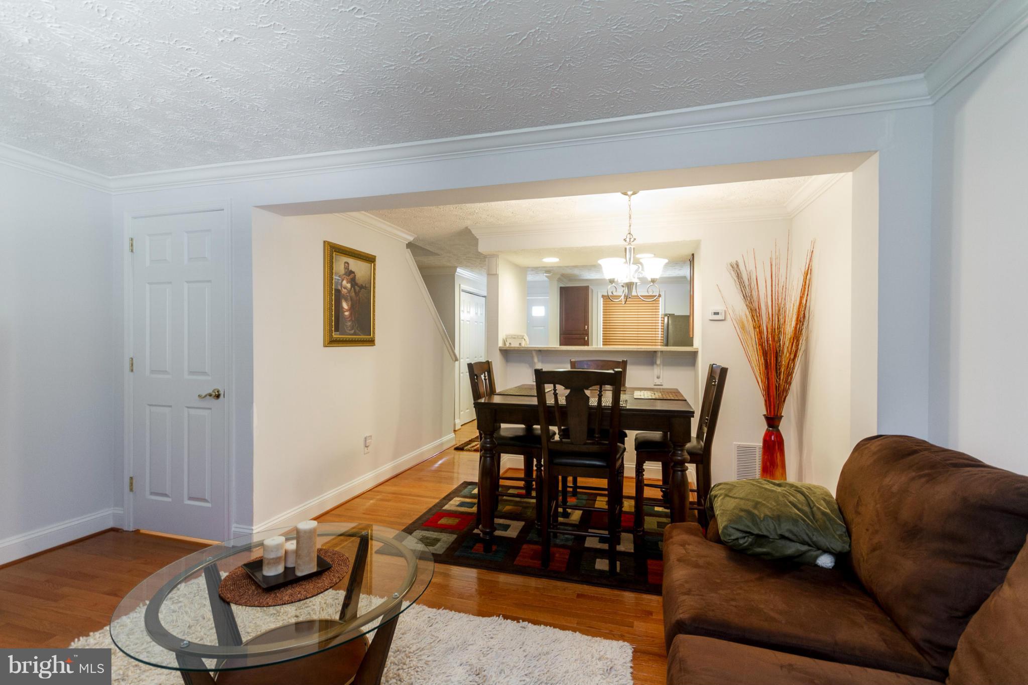 8357 Bark Tree Court Springfield, VA 22153 - Photo 14 of 30 Living Room to Dining Room