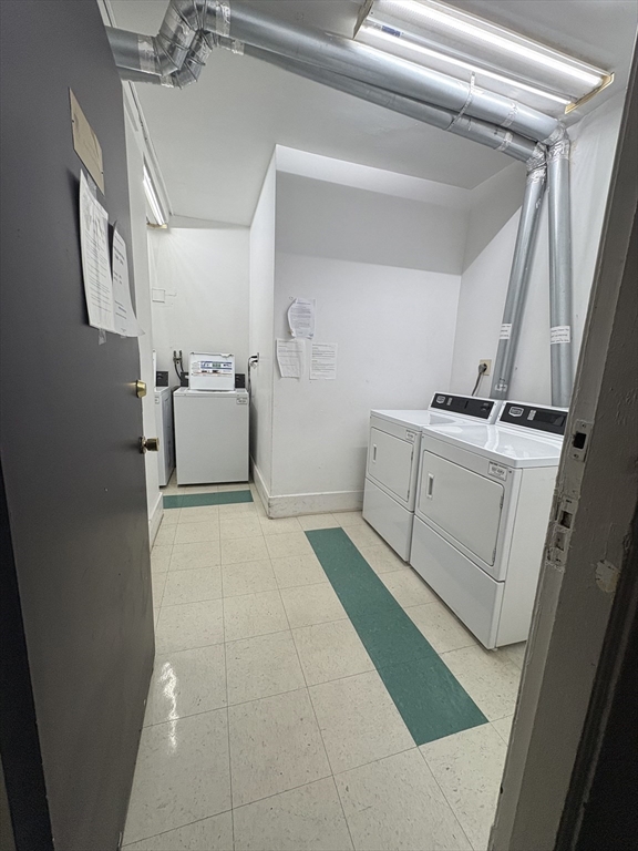 140 Chestnut Street, Unit 204 Springfield, MA 01103 - Photo 15 of 15 a bathroom with a sink a toilet and shower