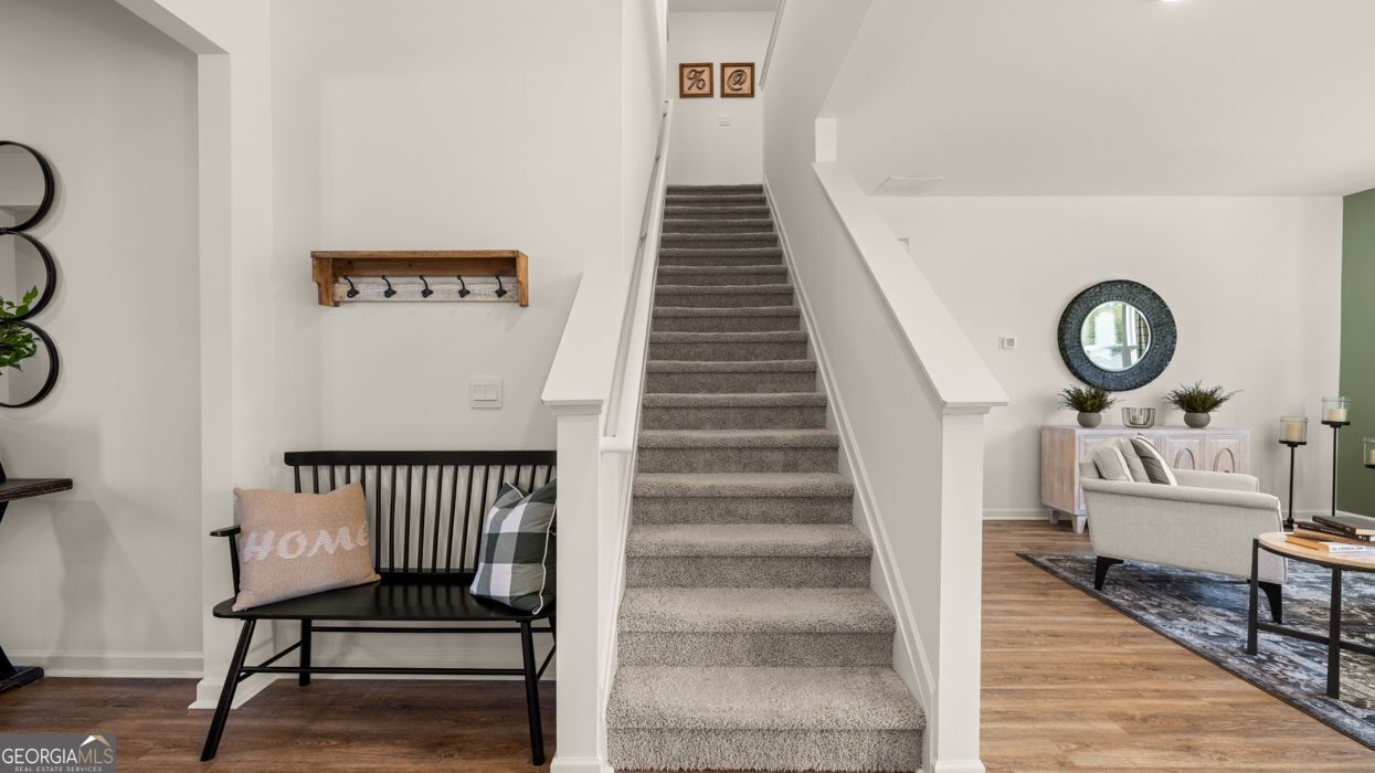 190 Aster Avenue Locust Grove, GA 30248 - Photo 28 of 45 a view of entryway and hall with wooden floor