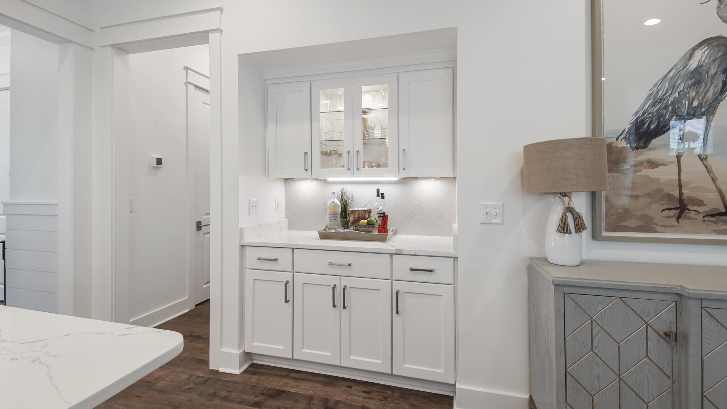 111 Firefly Way Watersound, FL 32461 - Photo 14 of 54 a bathroom with a sink and a mirror