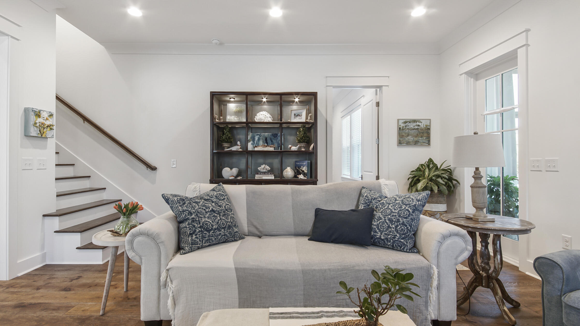 111 Firefly Way Watersound, FL 32461 - Photo 19 of 54 a living room with furniture and a potted plant