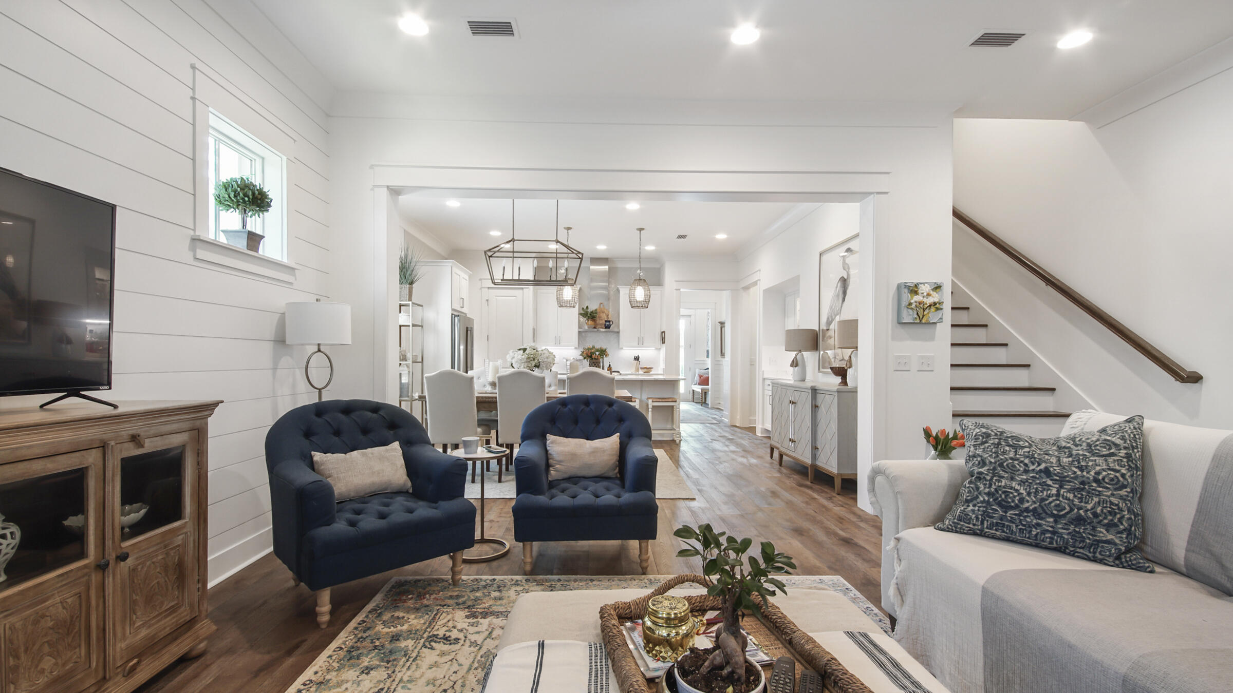 111 Firefly Way Watersound, FL 32461 - Photo 20 of 54 a living room with furniture and a flat screen tv