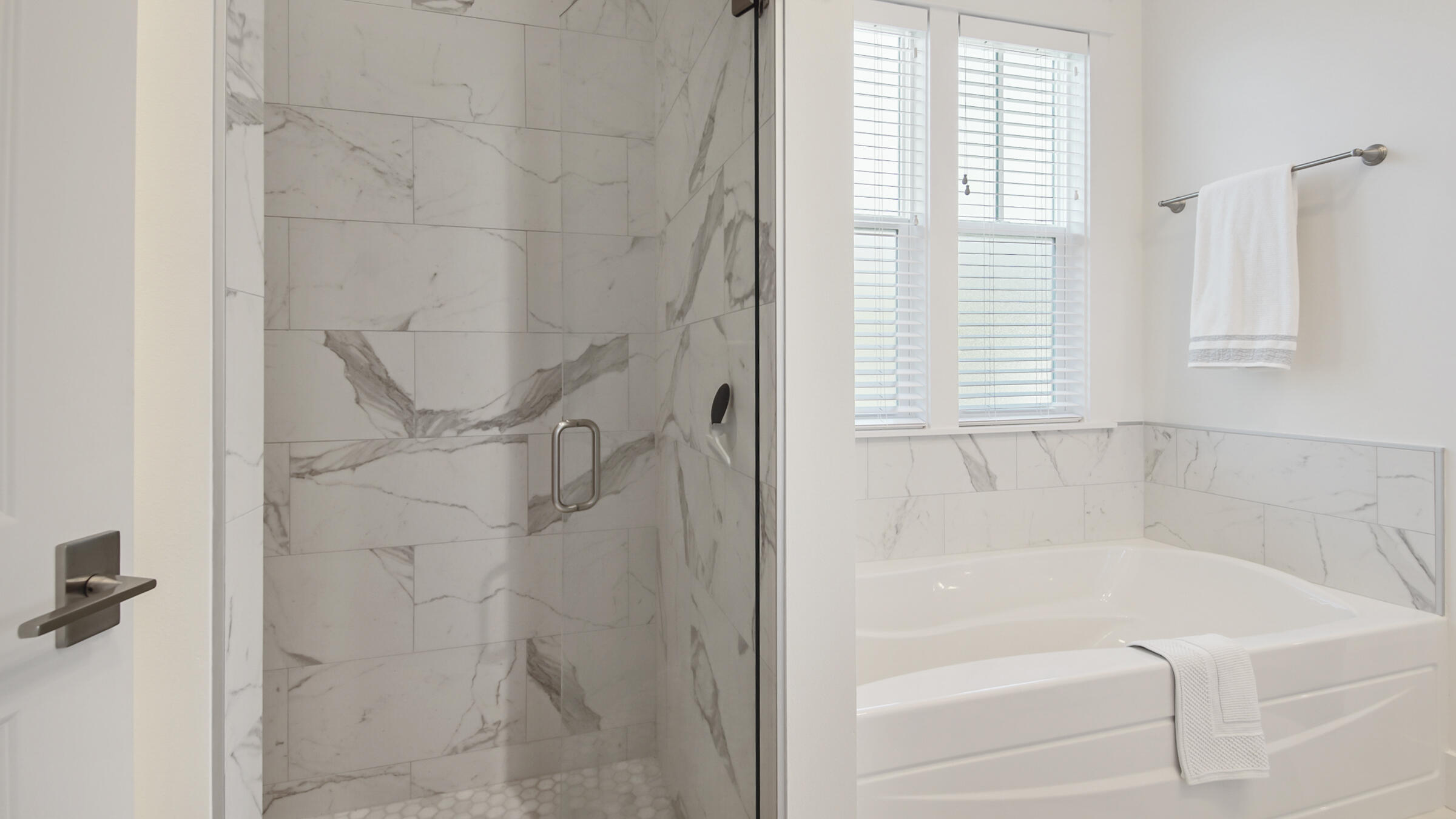 111 Firefly Way Watersound, FL 32461 - Photo 25 of 54 a bathroom with a bathtub