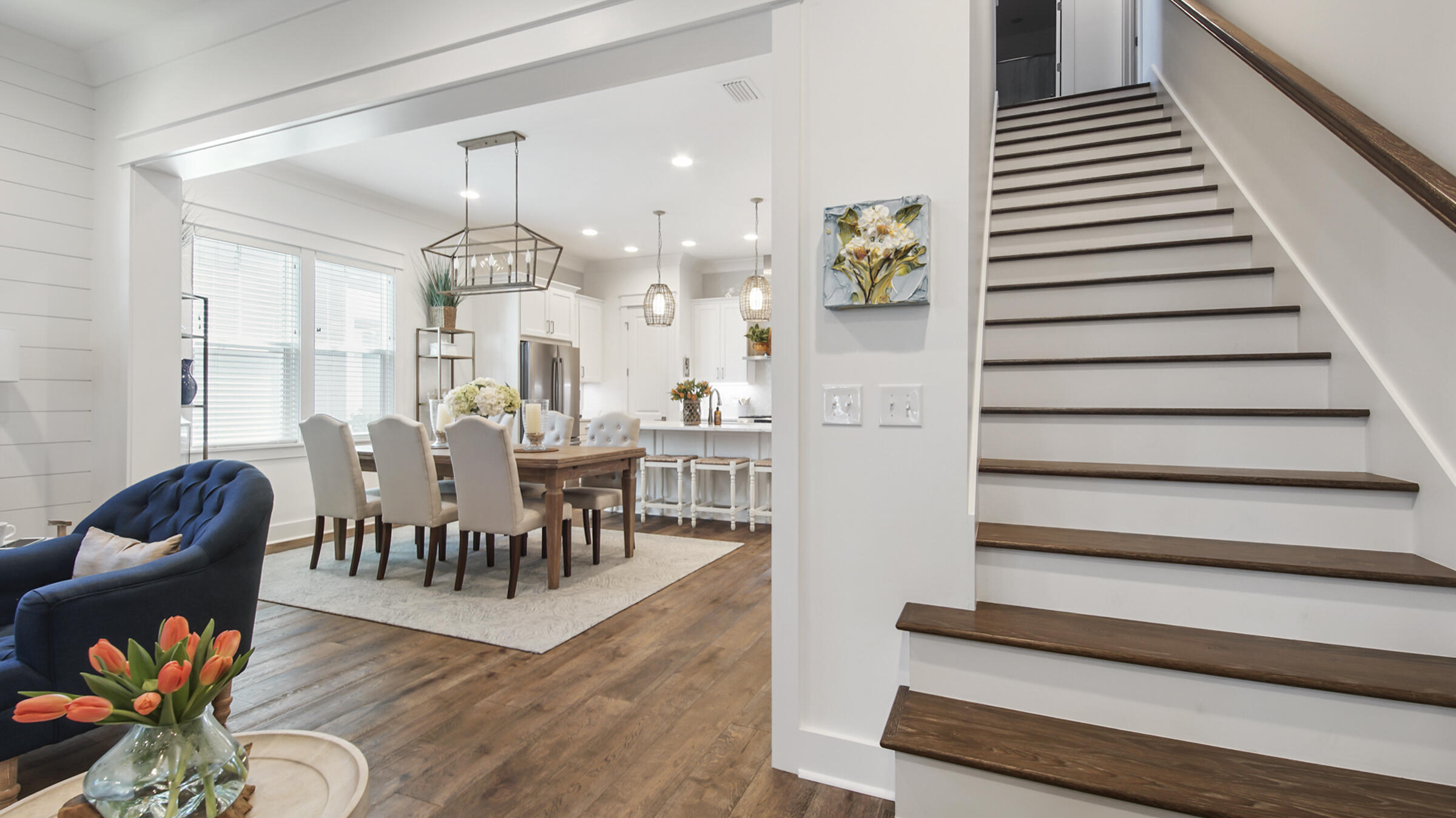 111 Firefly Way Watersound, FL 32461 - Photo 26 of 54 a dining room with furniture and wooden floor