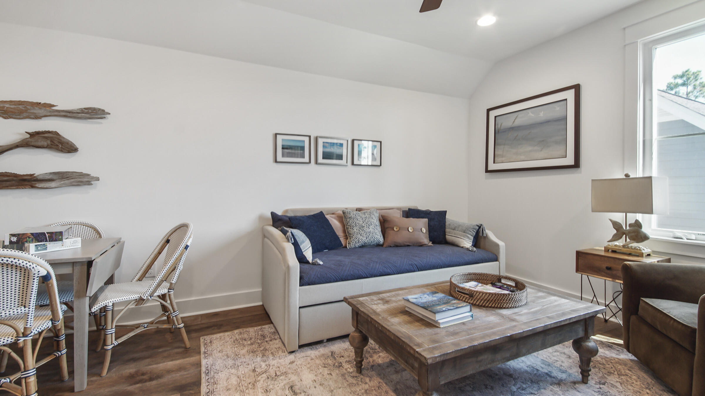 111 Firefly Way Watersound, FL 32461 - Photo 30 of 54 a living room with furniture and a table