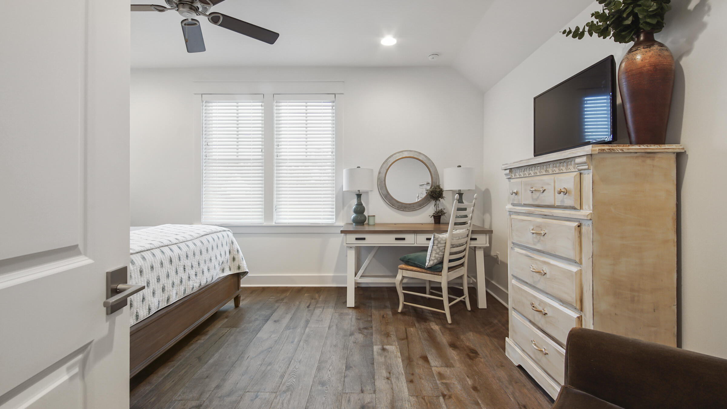 111 Firefly Way Watersound, FL 32461 - Photo 32 of 54 a view of a livingroom with furniture and a flat screen tv