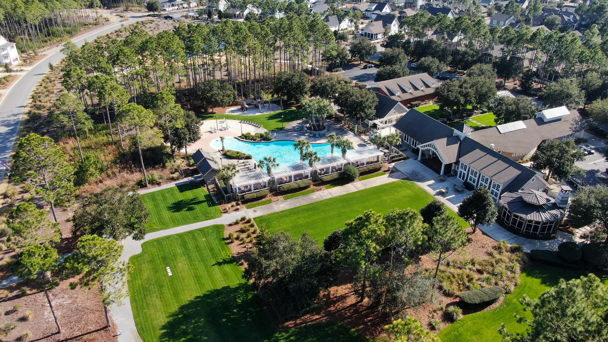 111 Firefly Way Watersound, FL 32461 - Photo 49 of 54 an aerial view of a house with a garden