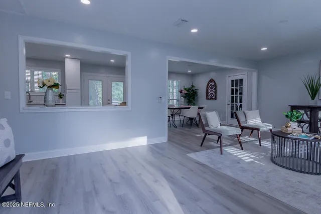 a kitchen with a table and chairs in it