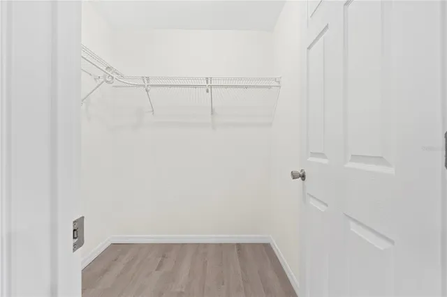 a view of a room with racks on the wall