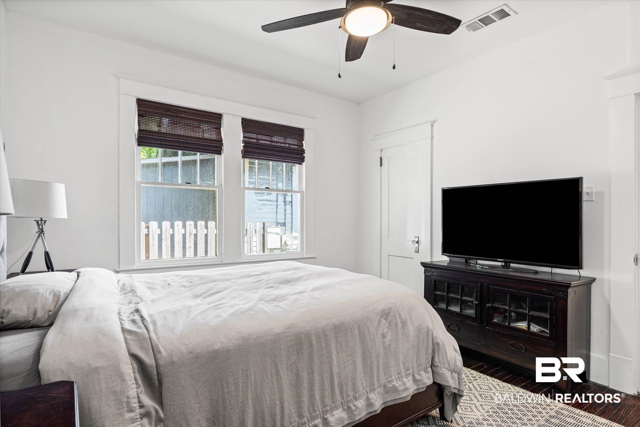 121 North Carlen Street Mobile, AL 36607 - Photo 11 of 21 Bedroom with dark wood-style floors and ceiling fan