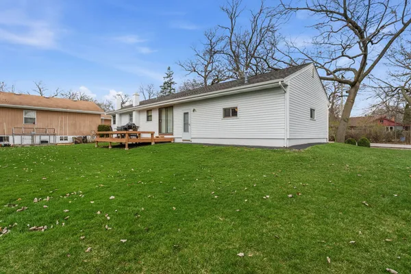 a backyard of a house with lots of green space