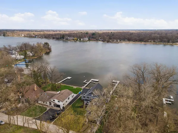a view of a lake with a yard