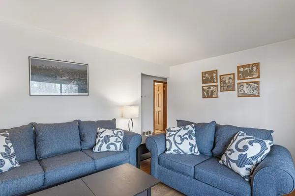 a living room with furniture and a couch