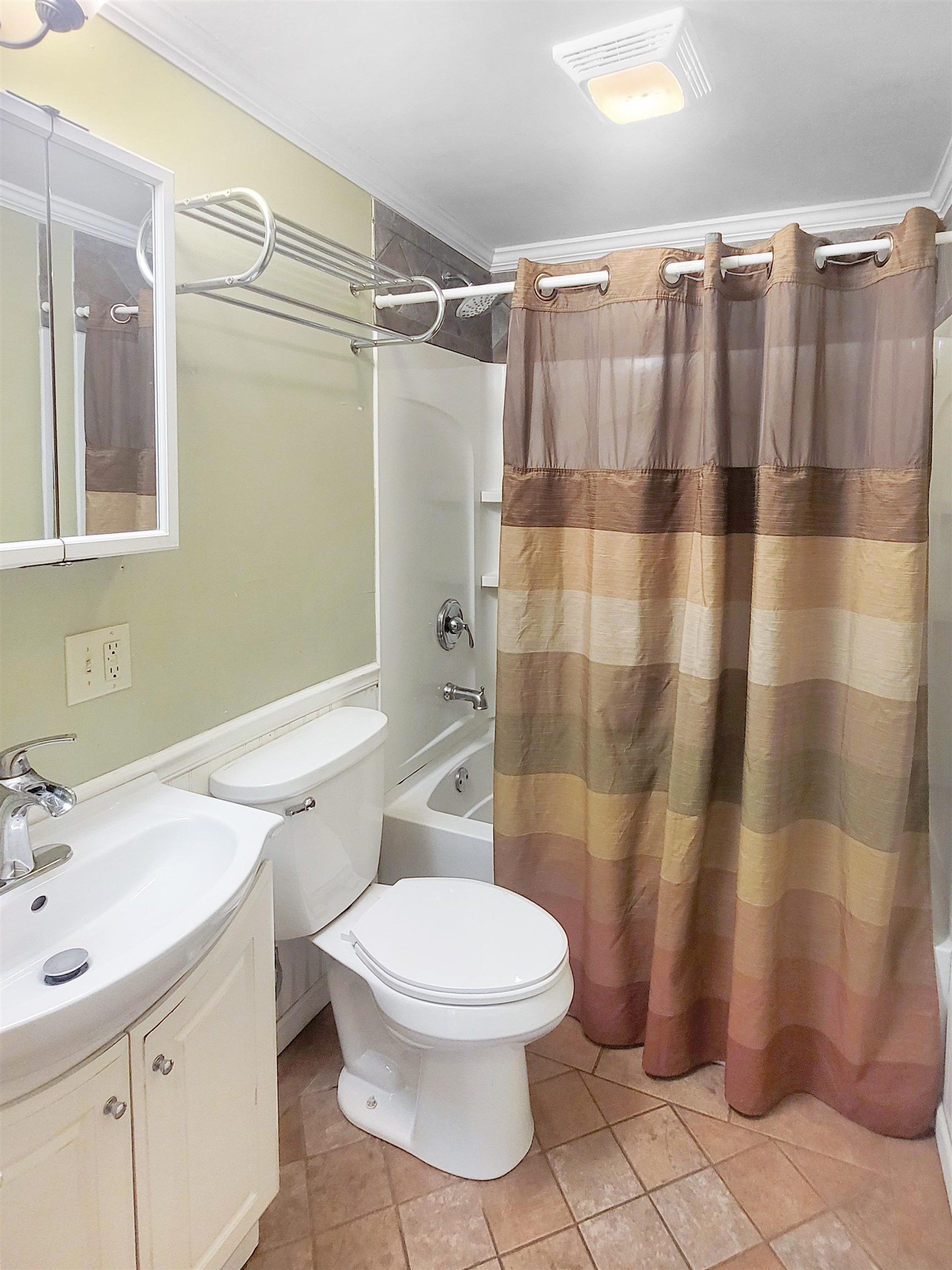 610 South High Street Galena, IL 61036 - Photo 16 of 22 a white toilet sitting next to a bathroom sink