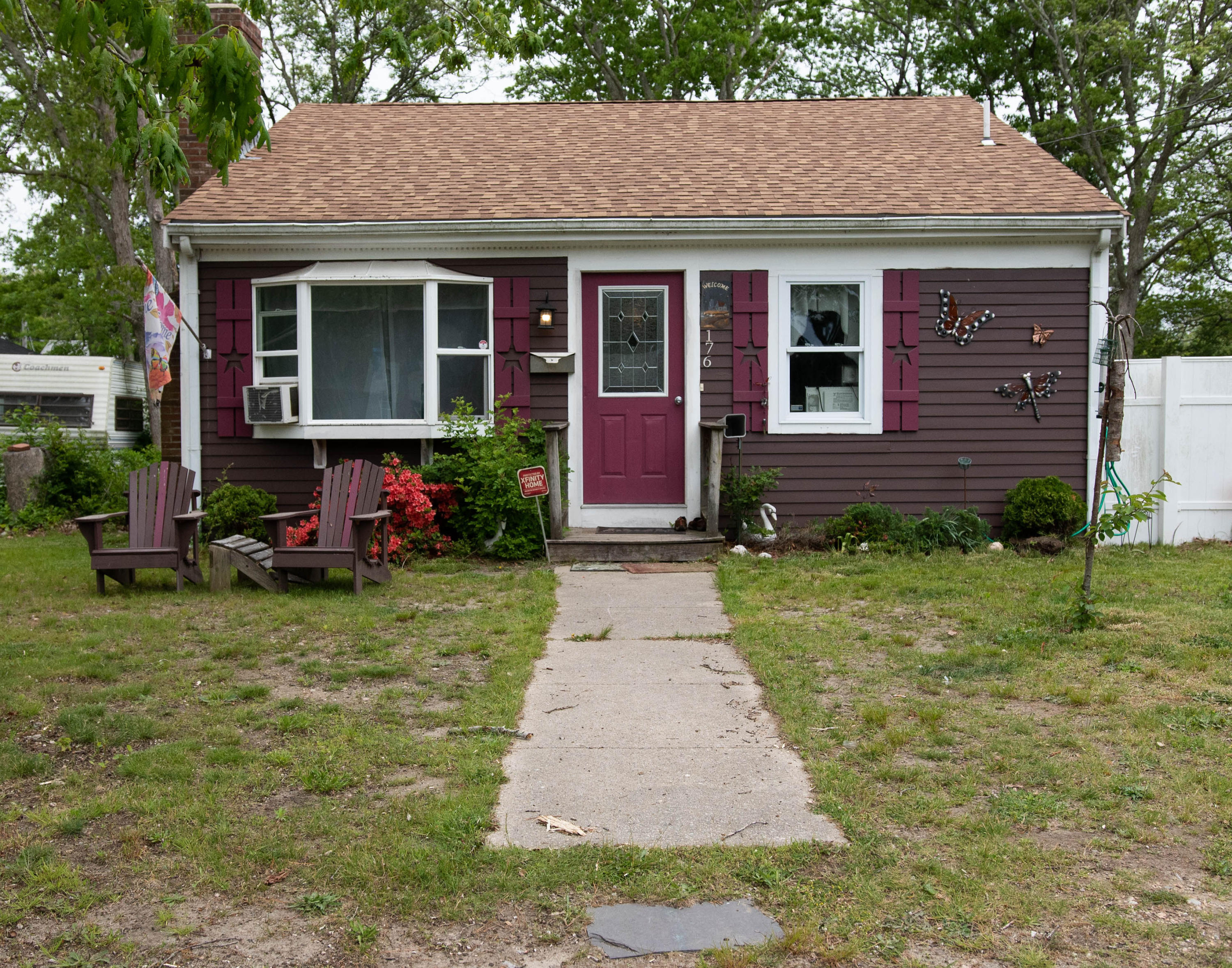176 Hinckley Road Hyannis, MA 02601 - Photo 1 of 13 a front view of a house with a yard and porch