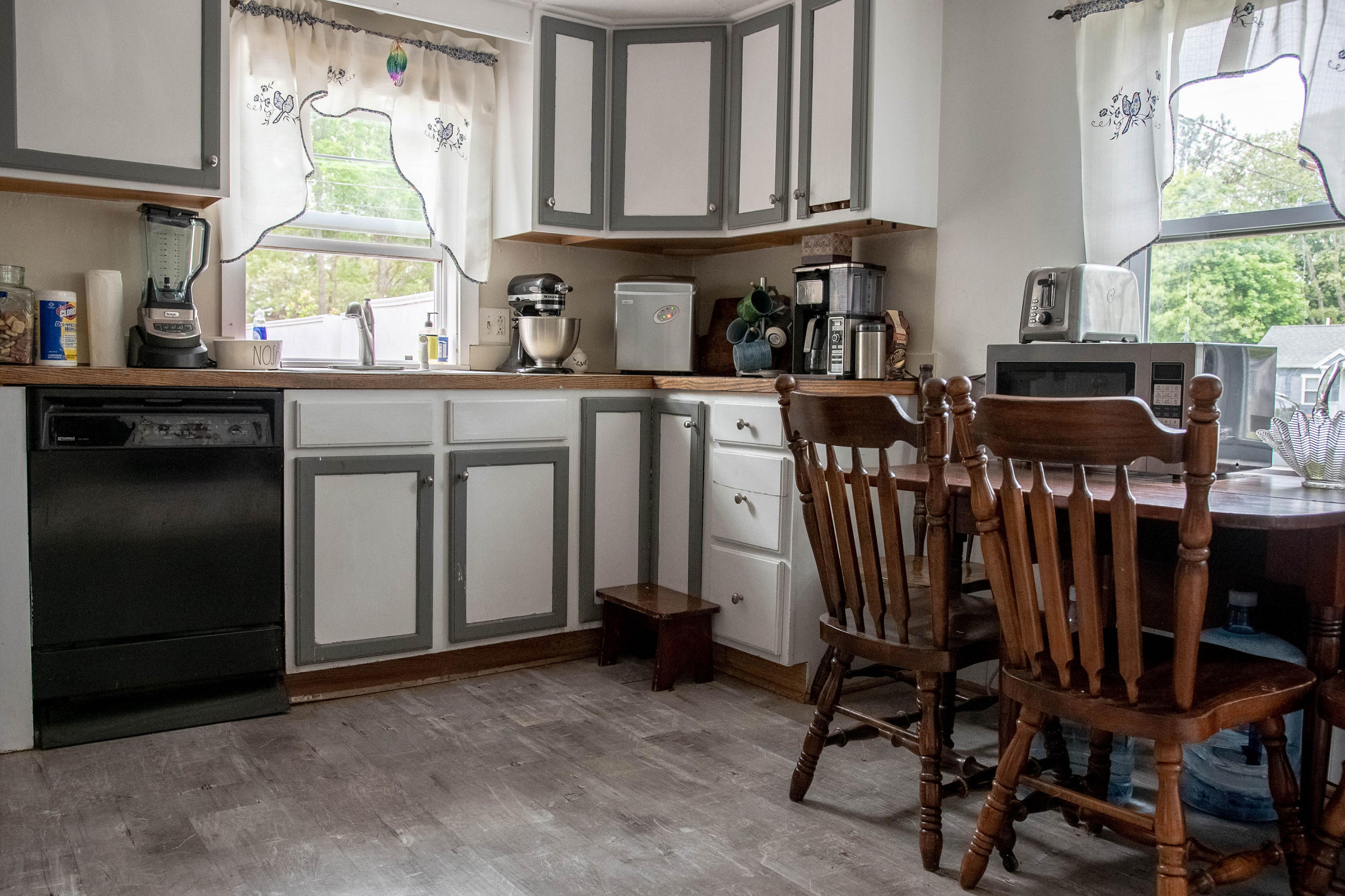 176 Hinckley Road Hyannis, MA 02601 - Photo 4 of 13 a view of a kitchen with granite countertop a window and furniture