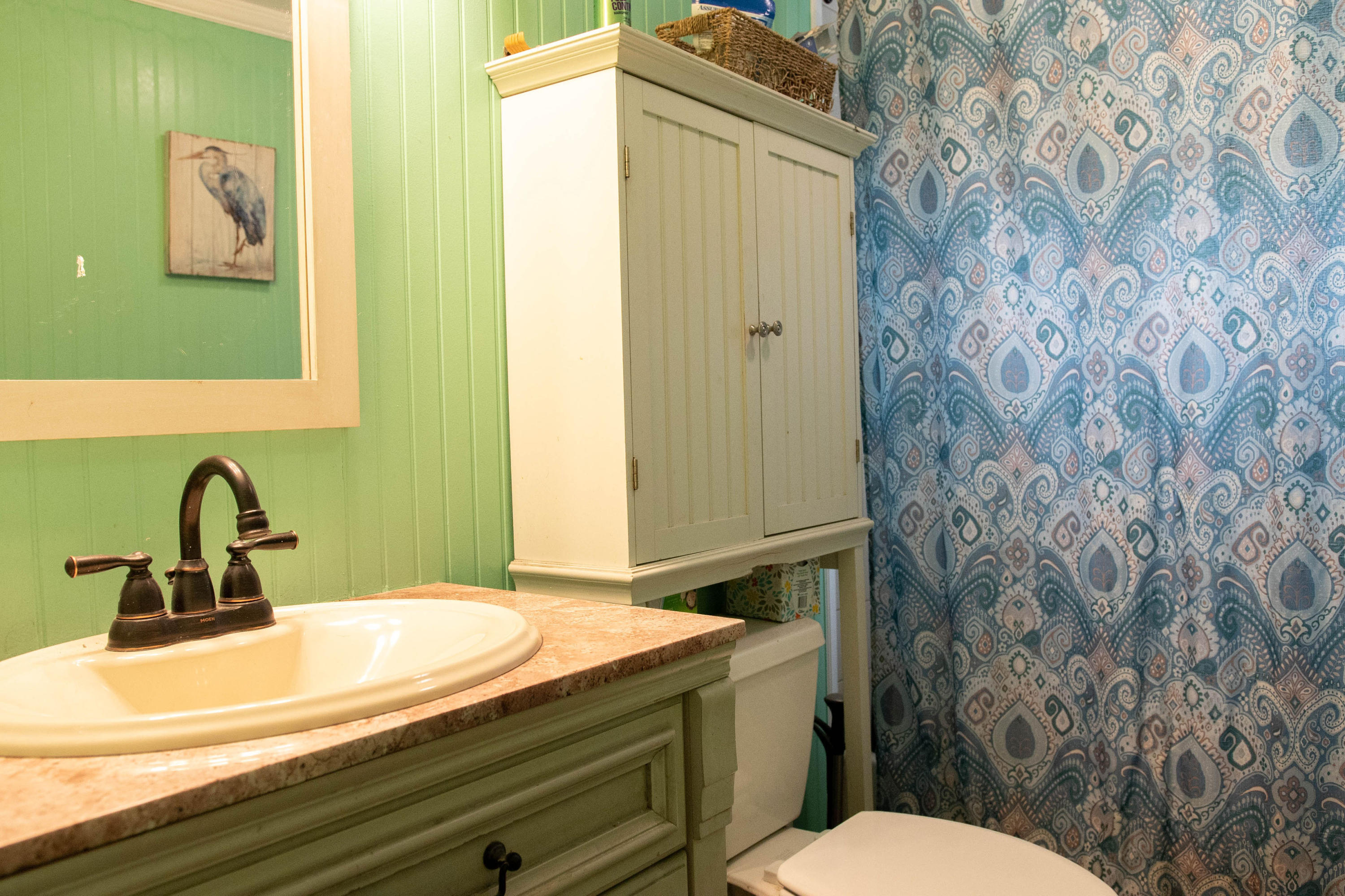 176 Hinckley Road Hyannis, MA 02601 - Photo 10 of 13 a bathroom with a sink and mirror