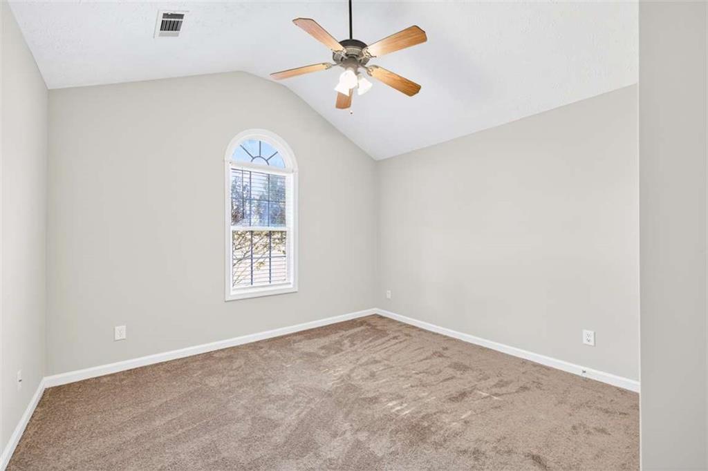 70 Tysor Court Jefferson, GA 30549 - Photo 38 of 50 an empty room with windows and fan