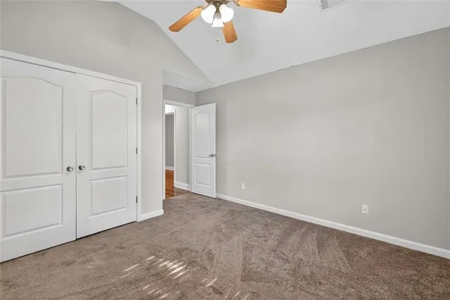 a view of an empty room and window in a room