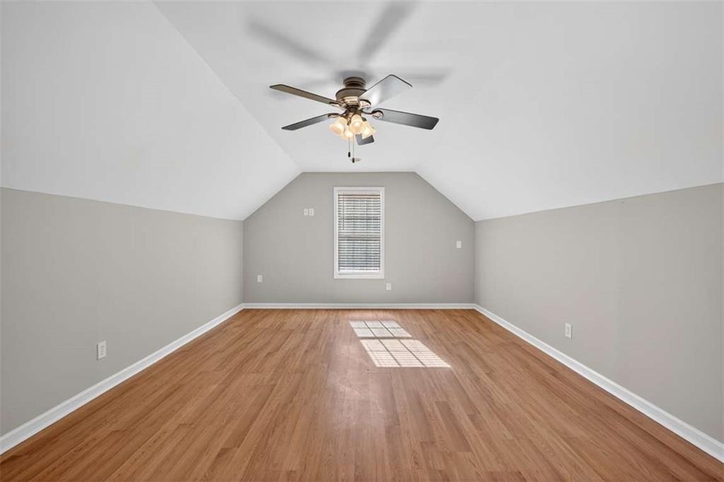 70 Tysor Court Jefferson, GA 30549 - Photo 43 of 50 wooden floor in an empty room with a window
