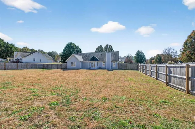 a view of an ocean beach and mountain