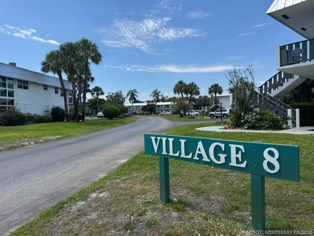 2929 Southeast Ocean Boulevard, Unit 1306 Stuart, FL 34996 - Photo 17 of 17 a view of a street sign on a sidewalk
