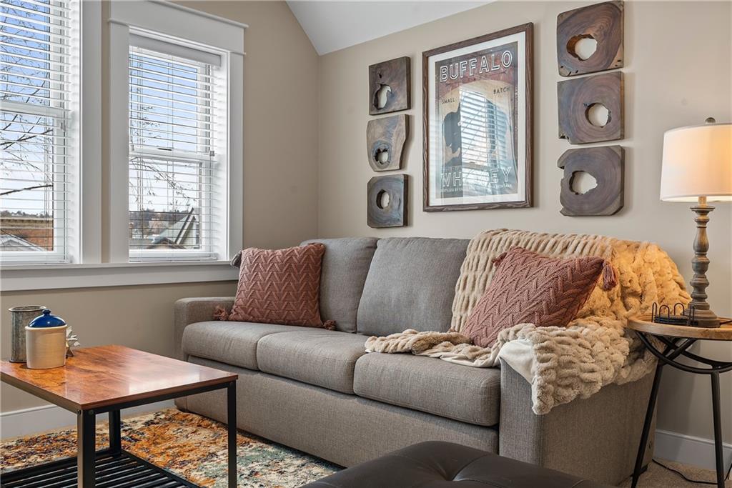 706 Ivy Street, Unit 2 Pittsburgh, PA 15232 - Photo 32 of 35 a living room with furniture and a window