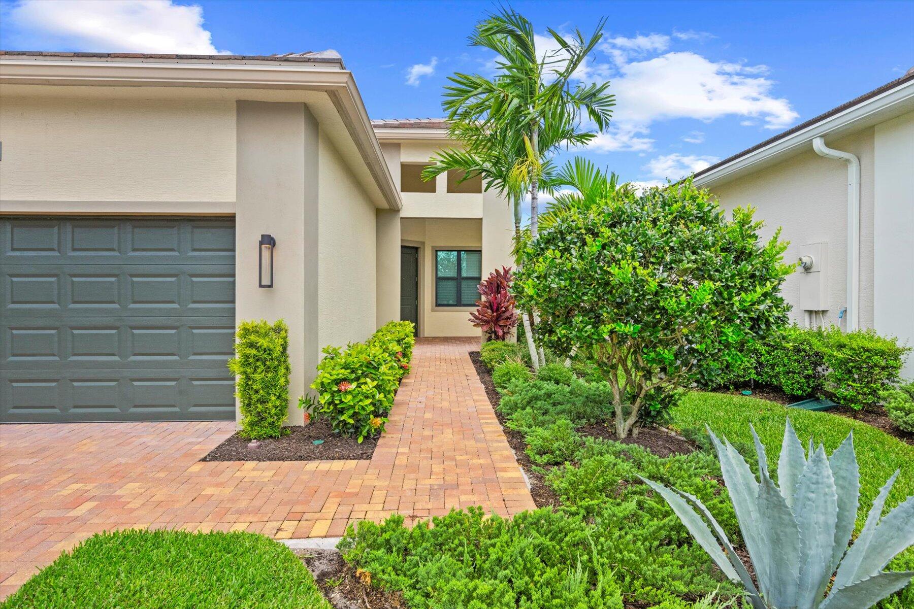 5409 Santa Rosa Lane Westlake, FL 33470 - Photo 4 of 51 a view of a pathway with plants