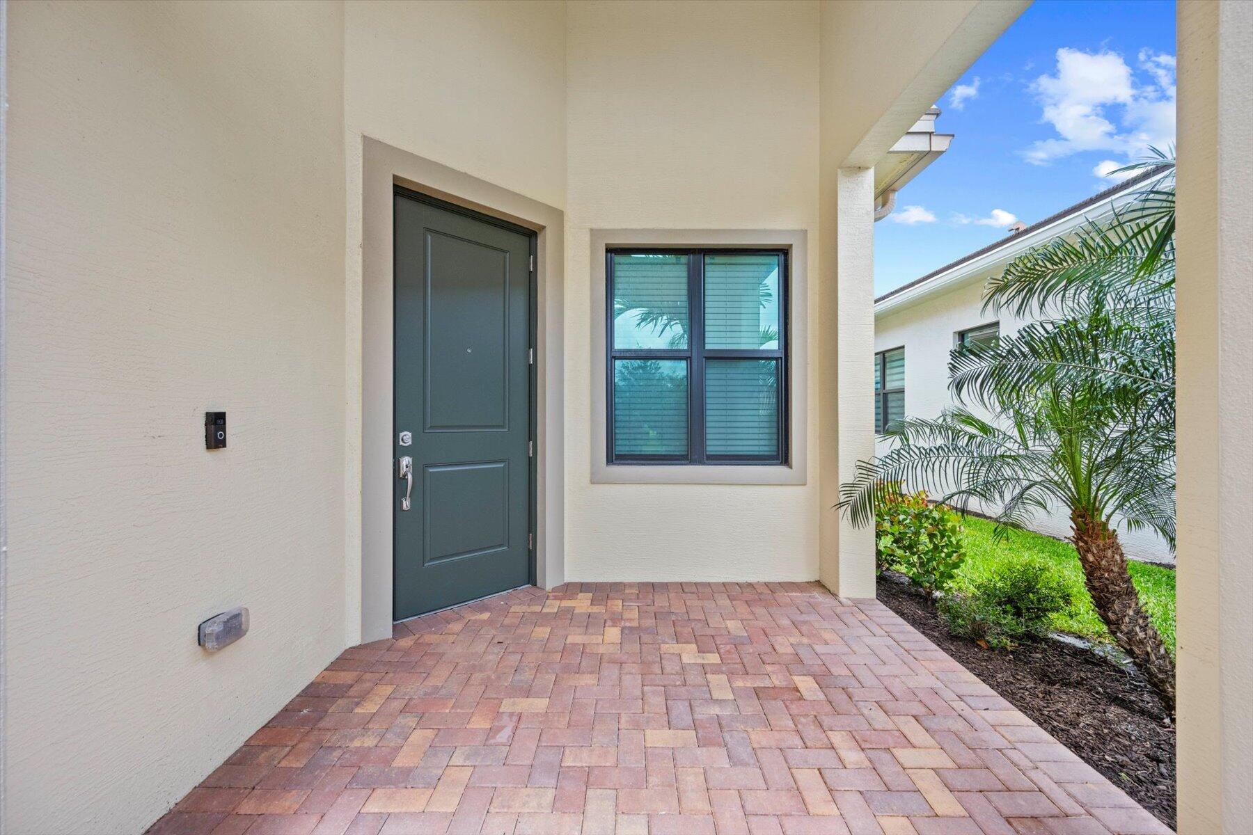 5409 Santa Rosa Lane Westlake, FL 33470 - Photo 5 of 51 a view of a backyard of a house