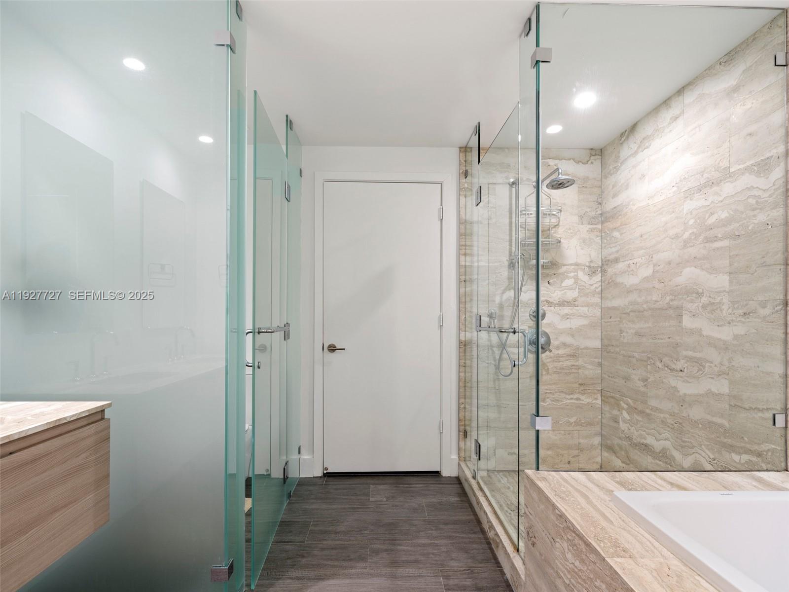 2900 Northeast 7th Avenue, Unit 4301 Miami, FL 33137 - Photo 15 of 24 a bathroom with a glass shower door