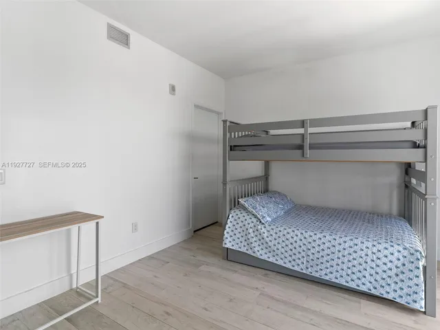 a room with a bed and a table