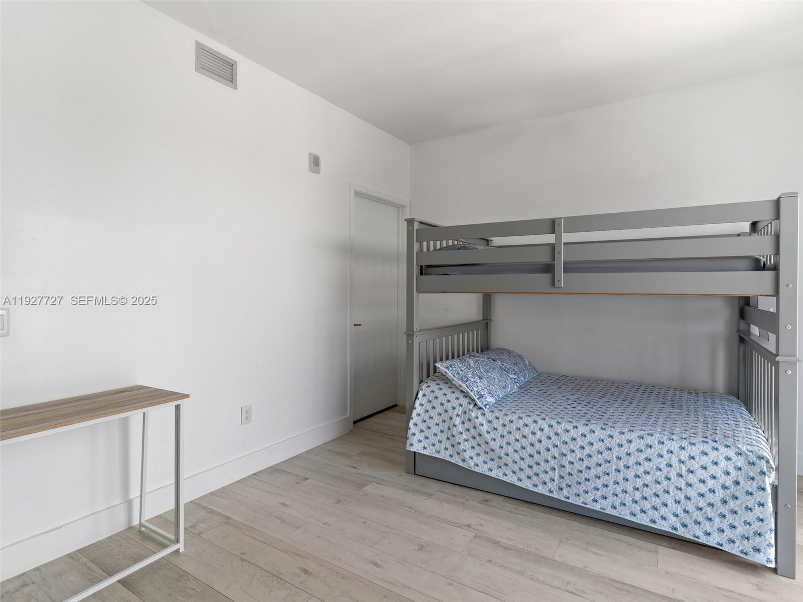 2900 Northeast 7th Avenue, Unit 4301 Miami, FL 33137 - Photo 18 of 24 a room with a bed and a table