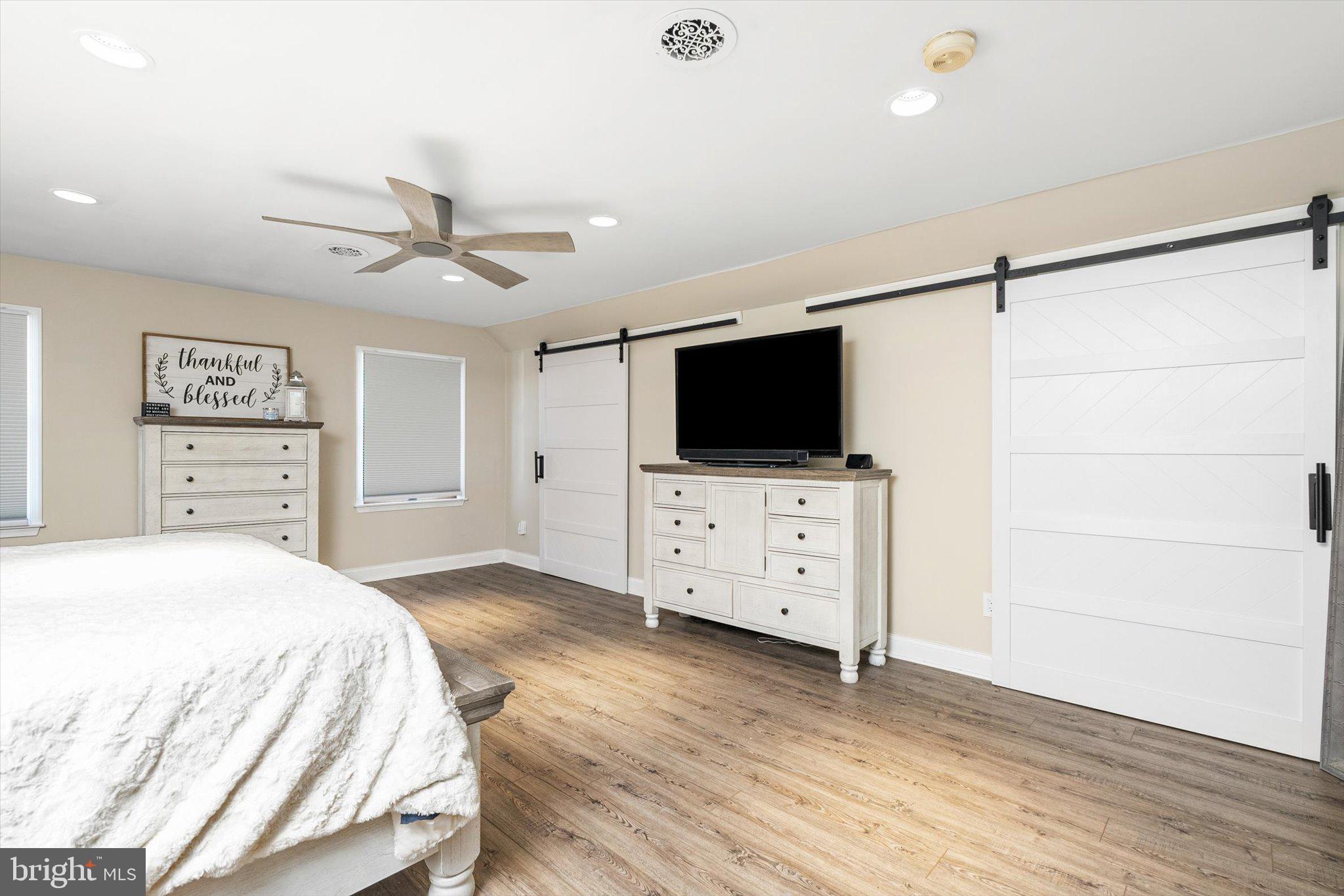 756 Province Line Road Allentown, NJ 08501 - Photo 24 of 41 a bedroom with a flat screen tv on dresser and a flat screen tv